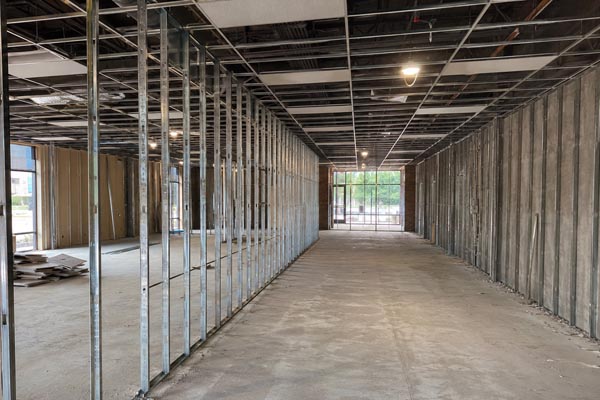 Image of the demolition of a retail space that will be converted into a cigar lounge